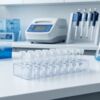 0.2 mL Optical Clear PCR Tubes – Flat & Domed Cap Options 6 PCR tubes placed in a thermal block for DNA amplification and laboratory testing
